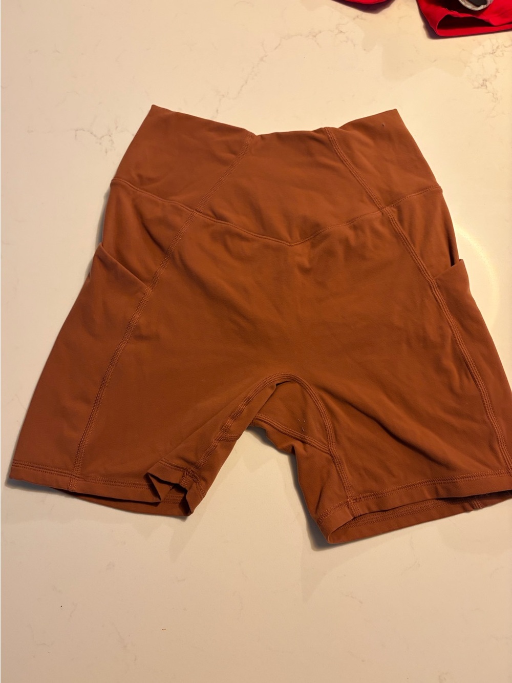 BuffBunny High-Rise Bike Shorts in Rust Brown